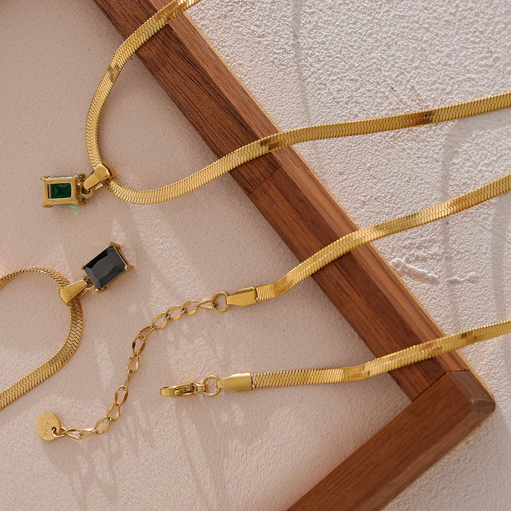 Nova Glow - Gold Flat Snake Necklace with Black Crystal - Image 5