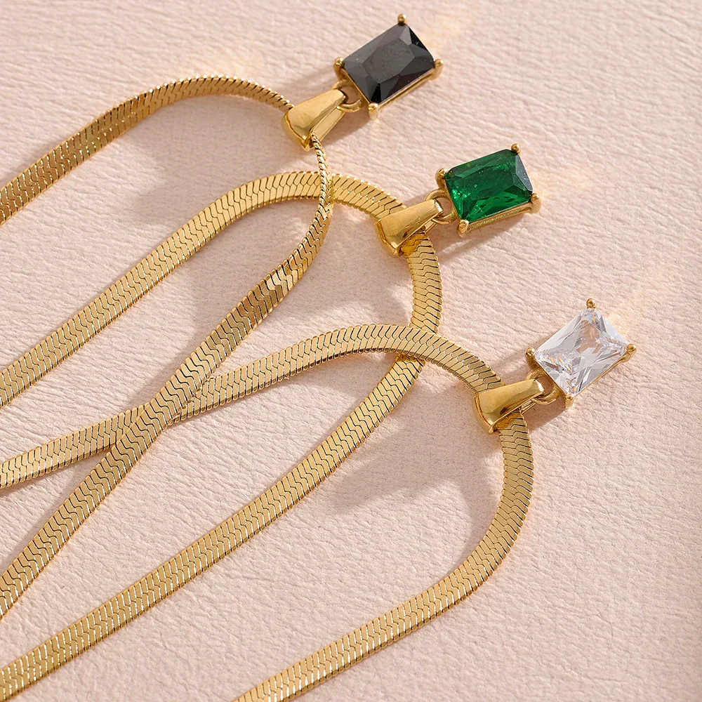 Nova Glow - Gold Flat Snake Necklace with Green Crystal - Image 2