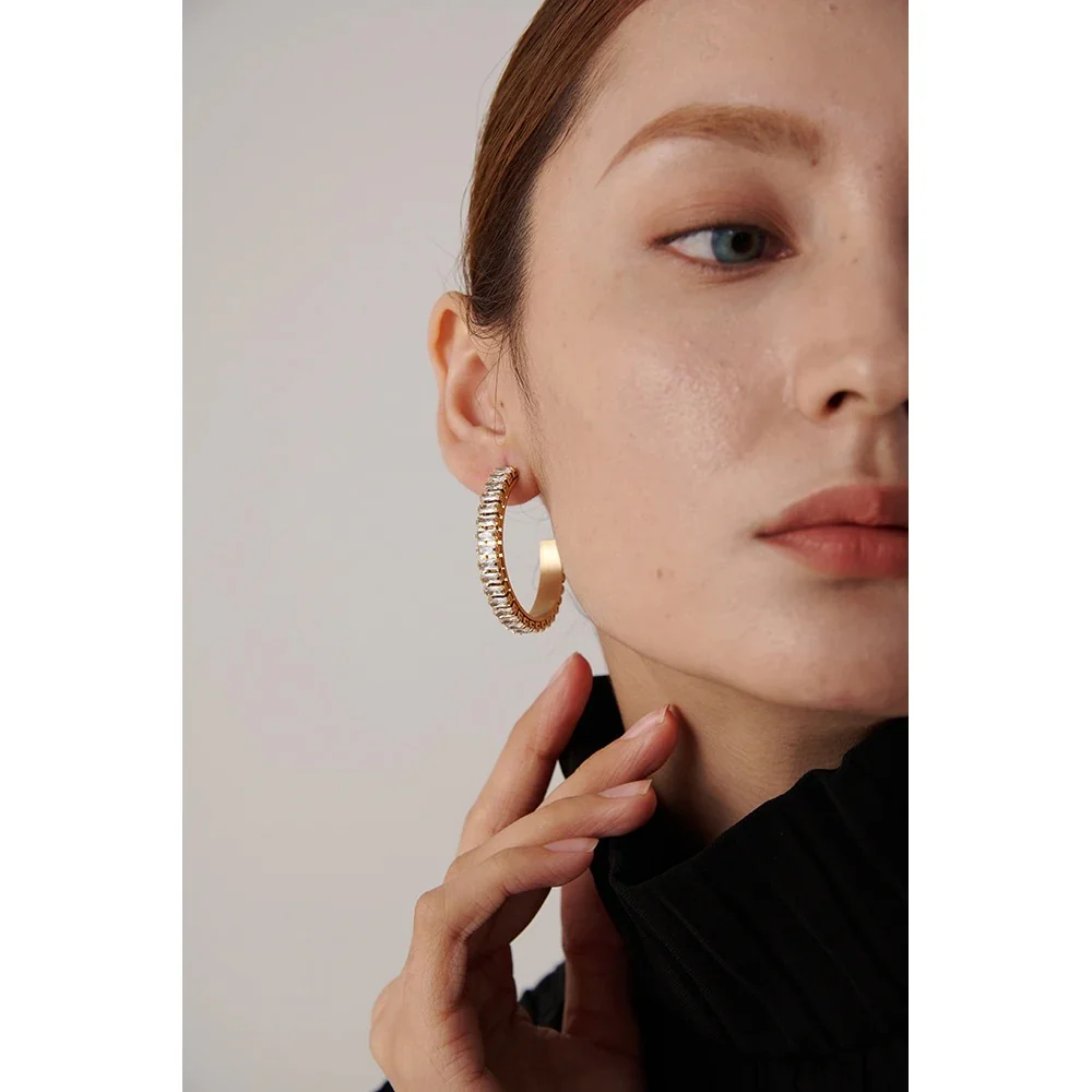 Stellar Sparklers: Cubic CZ Gold Stud Round Earrings - Image 2
